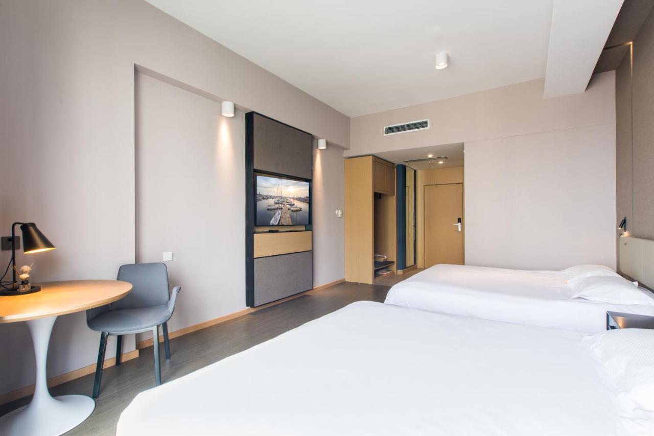 Qingdao Jinshan We+ Holiday Apartment Экстерьер фото